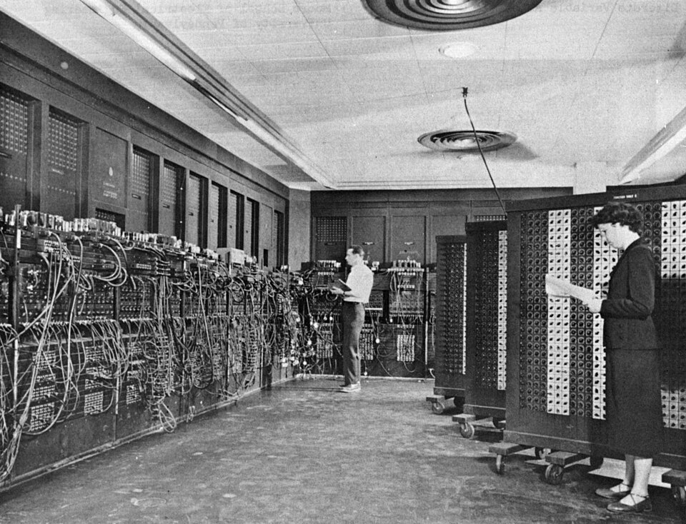 ENIAC in 1945, being programmed by two operators